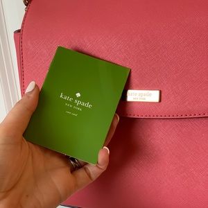 Kate Spade small satchel in bright flamingo color